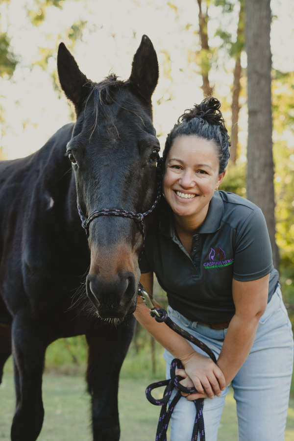 Brisbane equine therapy practitioner Camille Fenton with horse